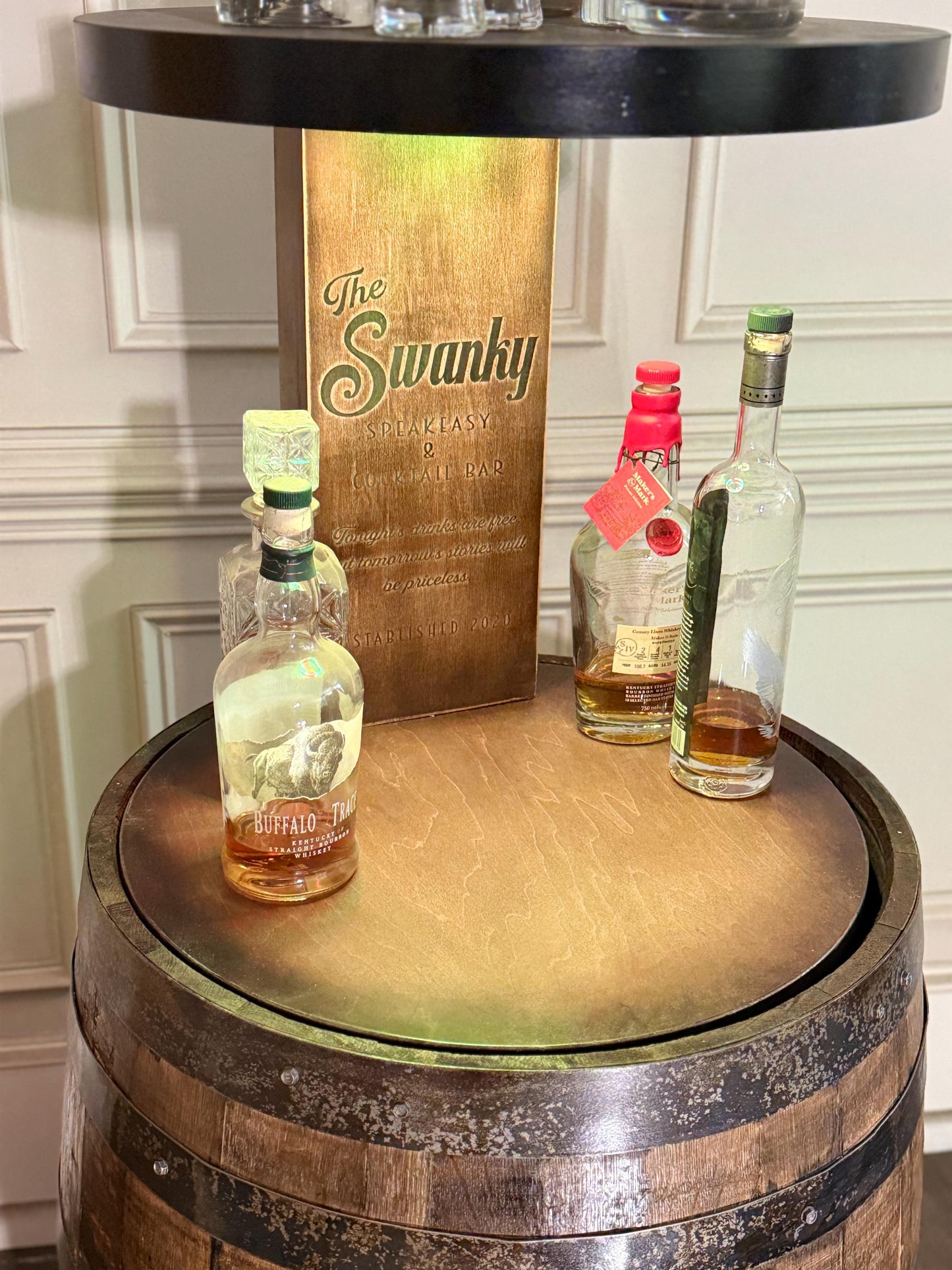 Motorized Pop Up Bourbon Barrel Cabinet. Remote control & LED lighting. Works with Alexa and Google Home. Custom engraving available.