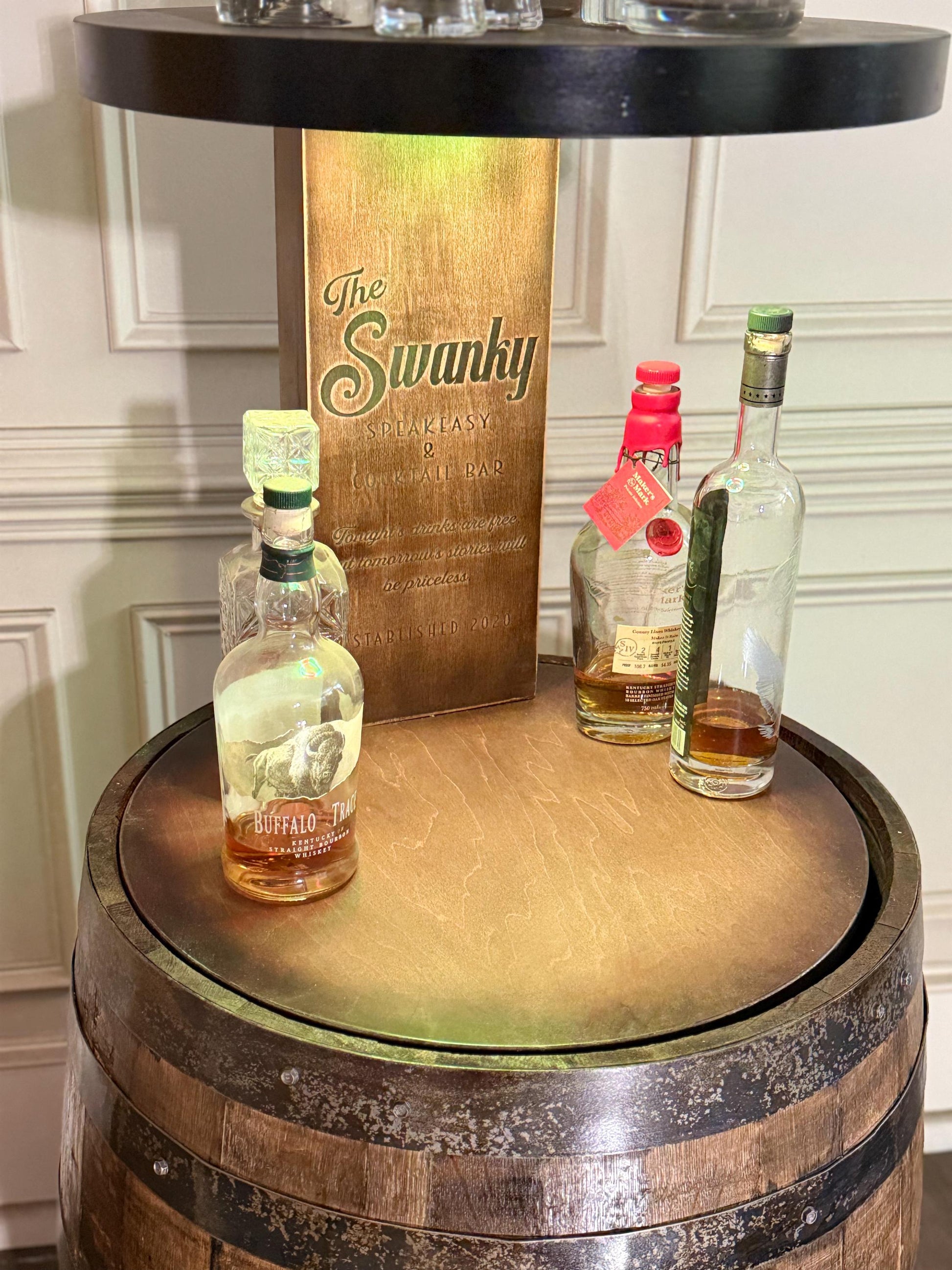 Motorized Pop Up Bourbon Barrel Cabinet. Remote control & LED lighting. Works with Alexa and Google Home. Custom engraving available.
