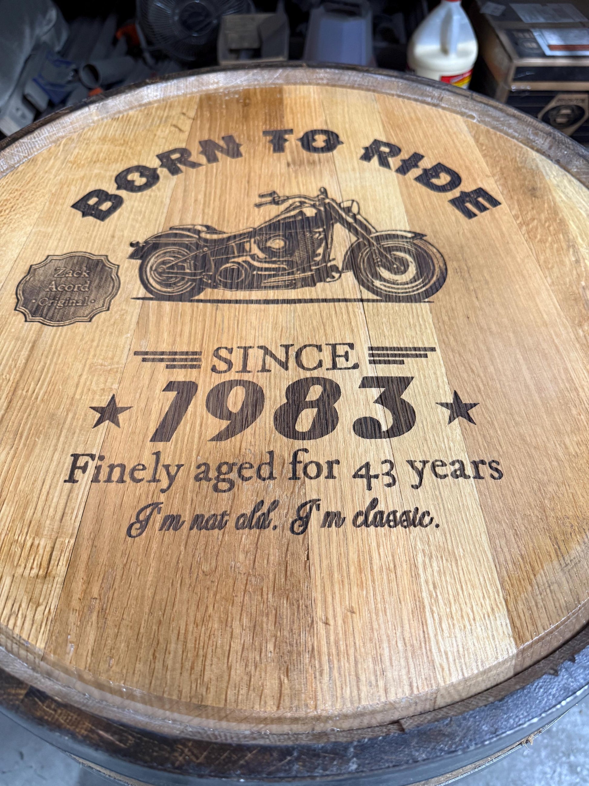 Motorized Pop Up Bourbon Barrel Cabinet. Remote control & LED lighting. Works with Alexa and Google Home. Custom engraving available.