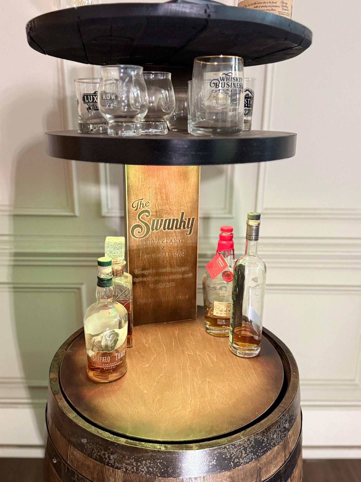 Motorized Pop Up Bourbon Barrel Cabinet. Remote control & LED lighting. Works with Alexa and Google Home. Custom engraving available.