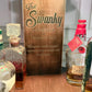 Motorized Pop Up Bourbon Barrel Cabinet. Remote control & LED lighting. Works with Alexa and Google Home. Custom engraving available.