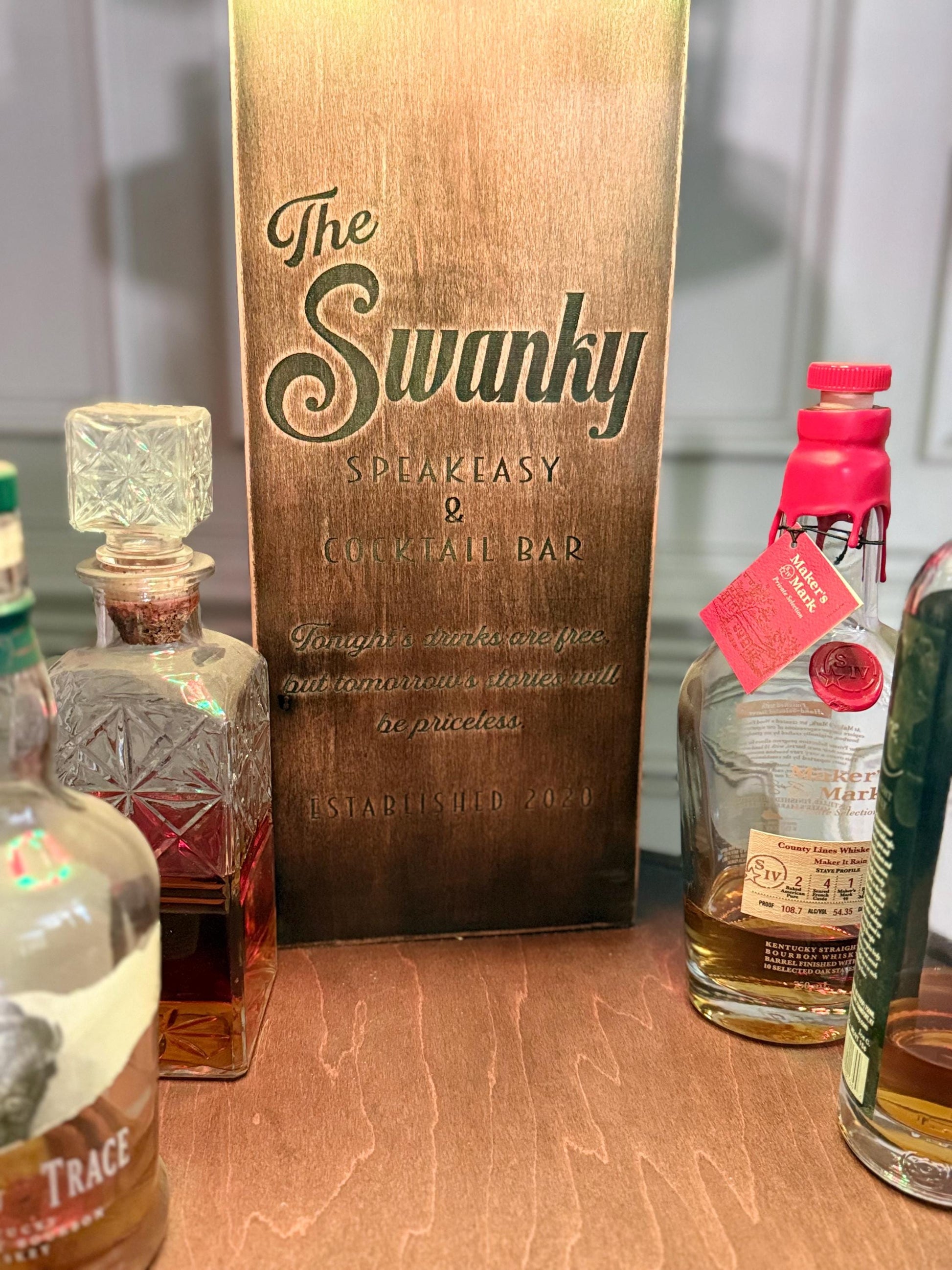 Motorized Pop Up Bourbon Barrel Cabinet. Remote control & LED lighting. Works with Alexa and Google Home. Custom engraving available.