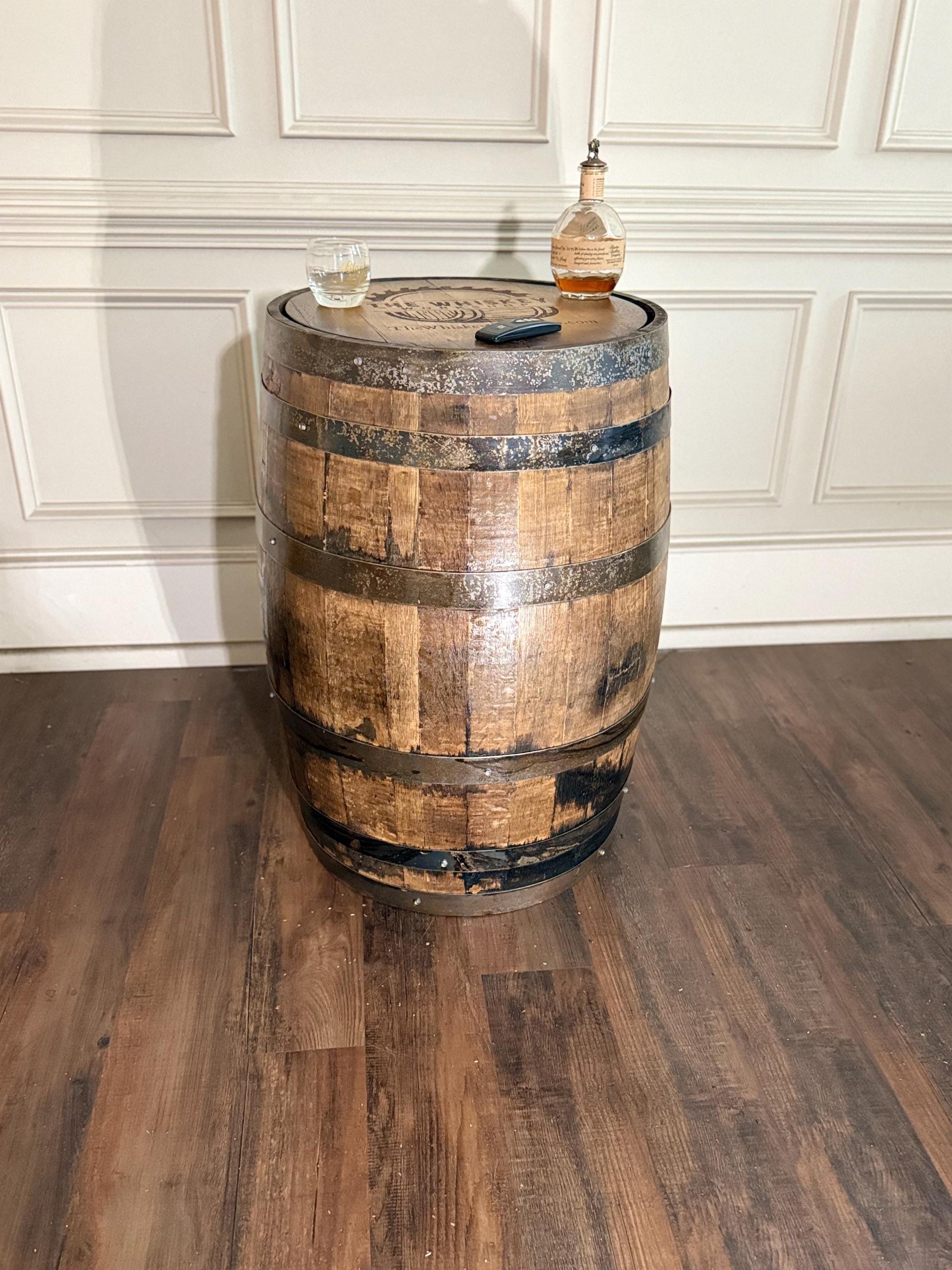 Motorized Pop Up Bourbon Barrel Cabinet. Remote control & LED lighting. Works with Alexa and Google Home. Custom engraving available.