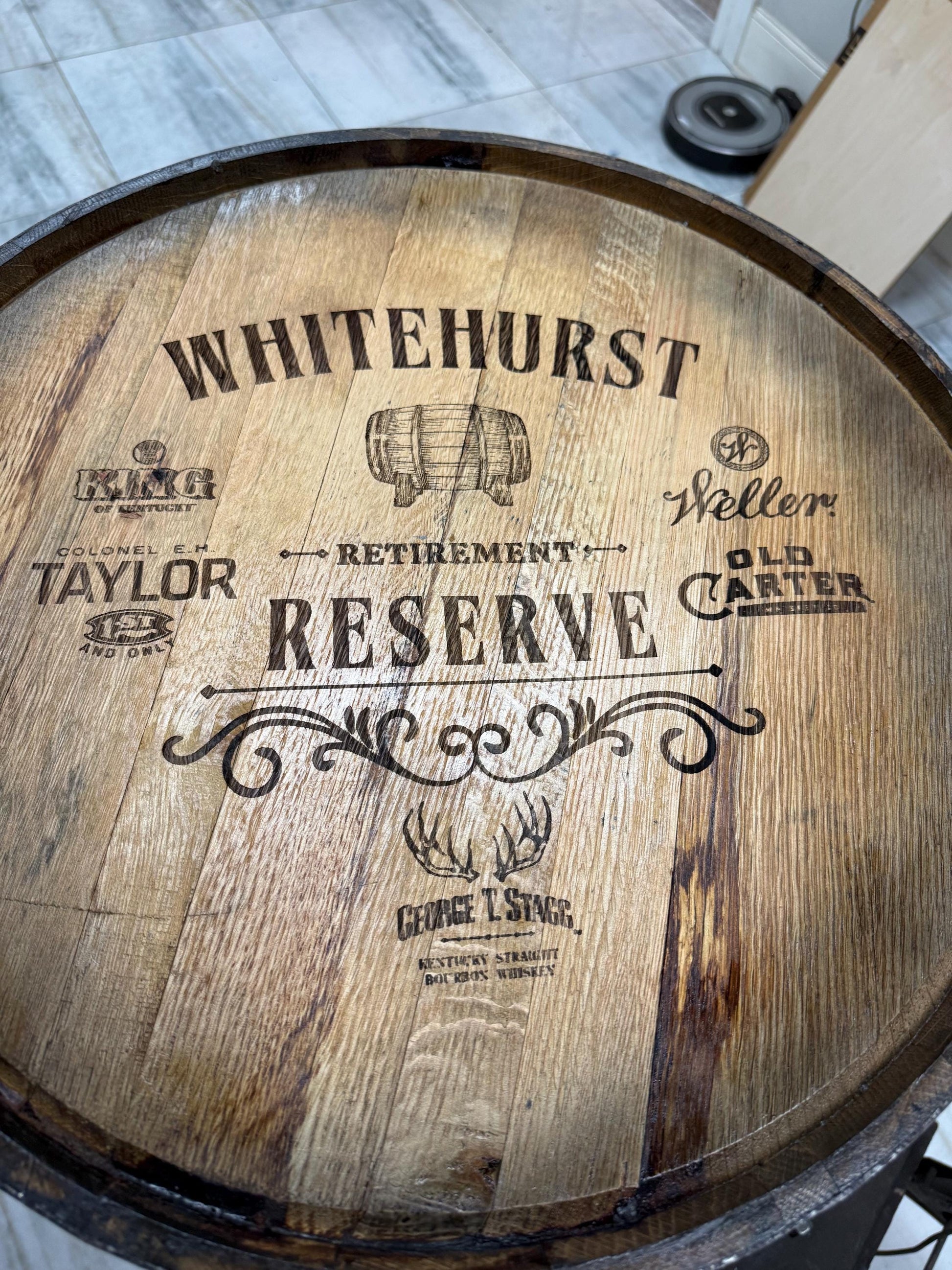 Motorized Pop Up Bourbon Barrel Cabinet. Remote control & LED lighting. Works with Alexa and Google Home. Custom engraving available.