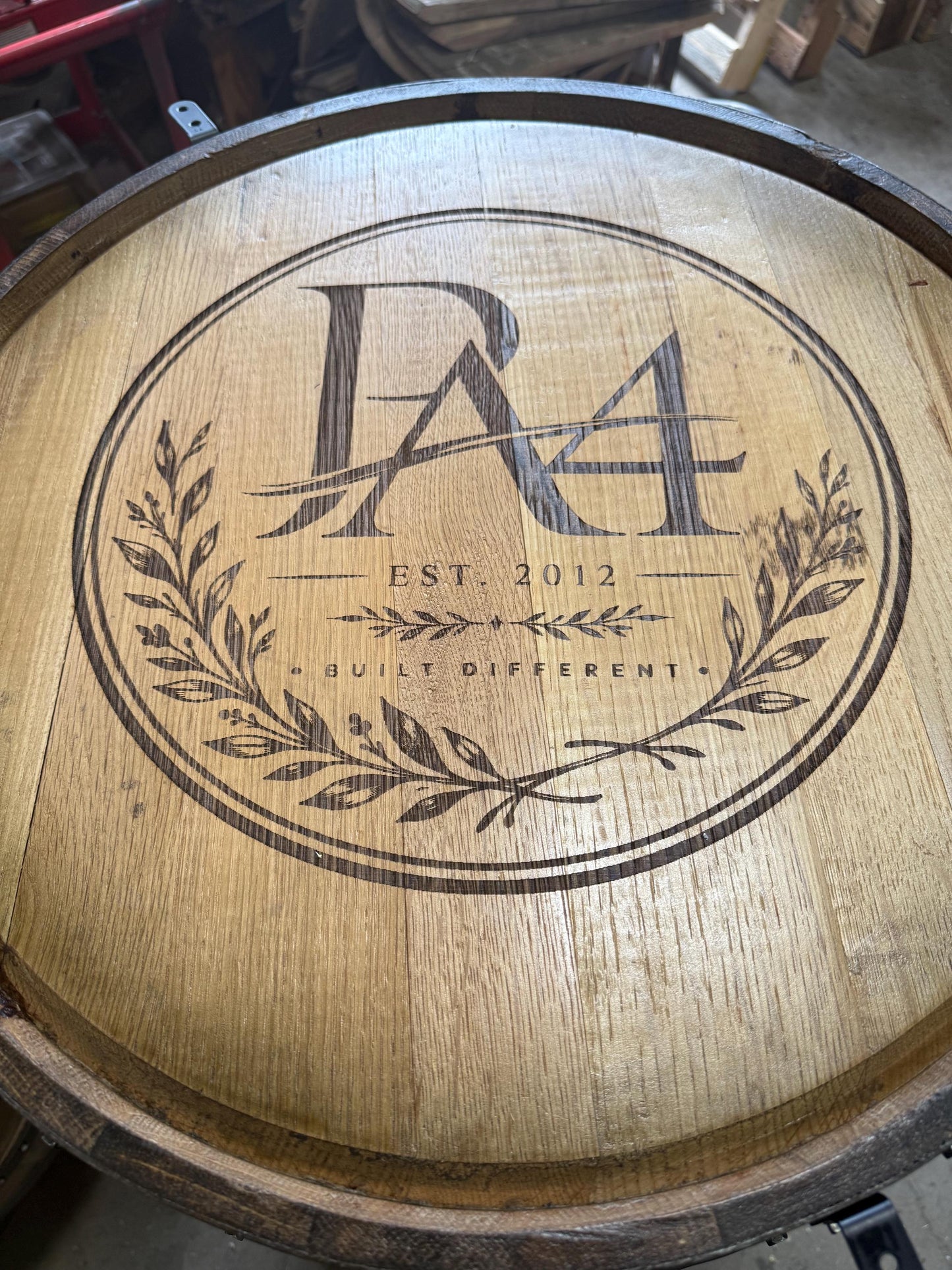 Motorized Pop Up Bourbon Barrel Cabinet. Remote control & LED lighting. Works with Alexa and Google Home. Custom engraving available.