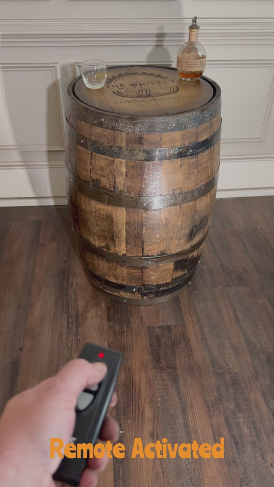 Motorized Pop Up Bourbon Barrel Cabinet.  Remote control & LED lighting.  Works with Alexa and Google Home. Custom engraving available.