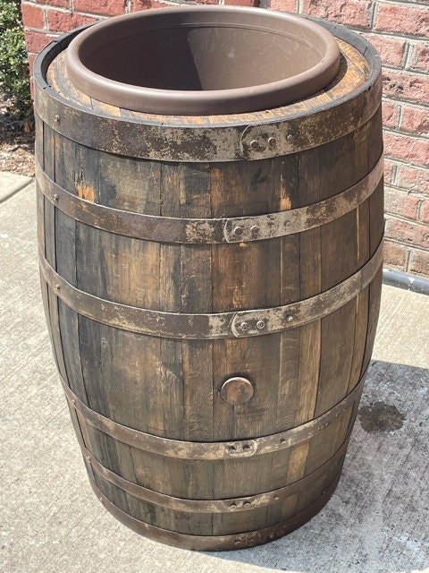 Wine/whiskey shops barrel wood planter made from authentic reclaimed barrel wood.